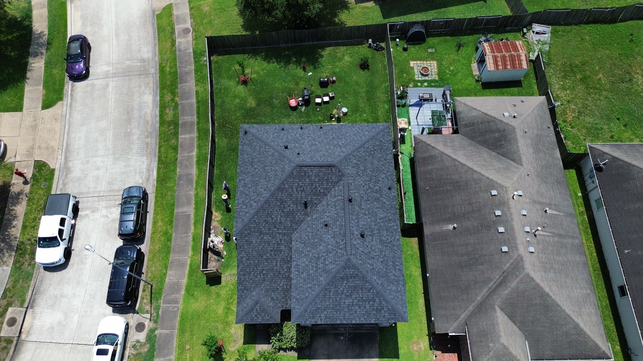 Completed asphalt shingle roof on a residential home in Houston 